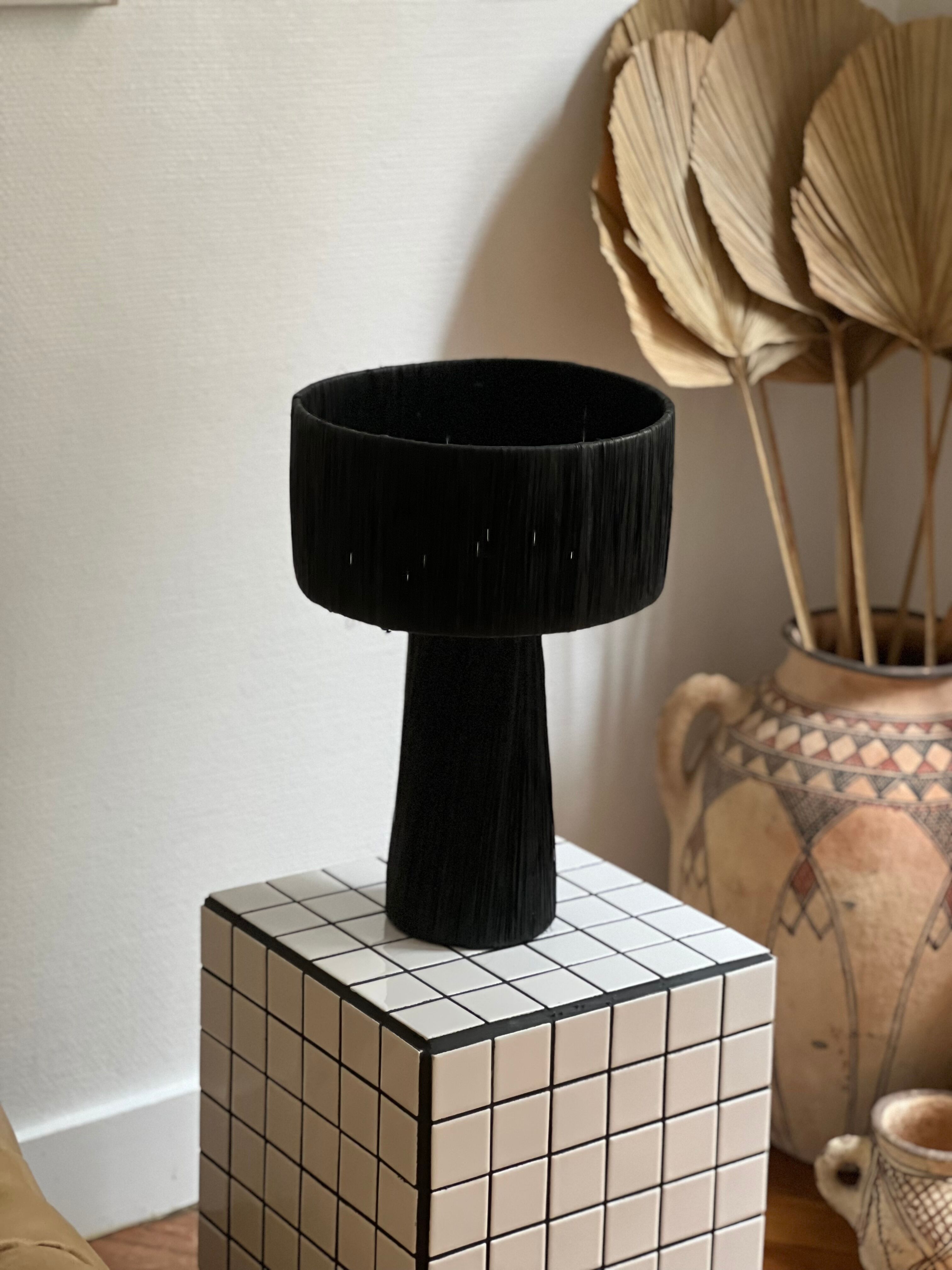Minimalist black raffia bedside lamp