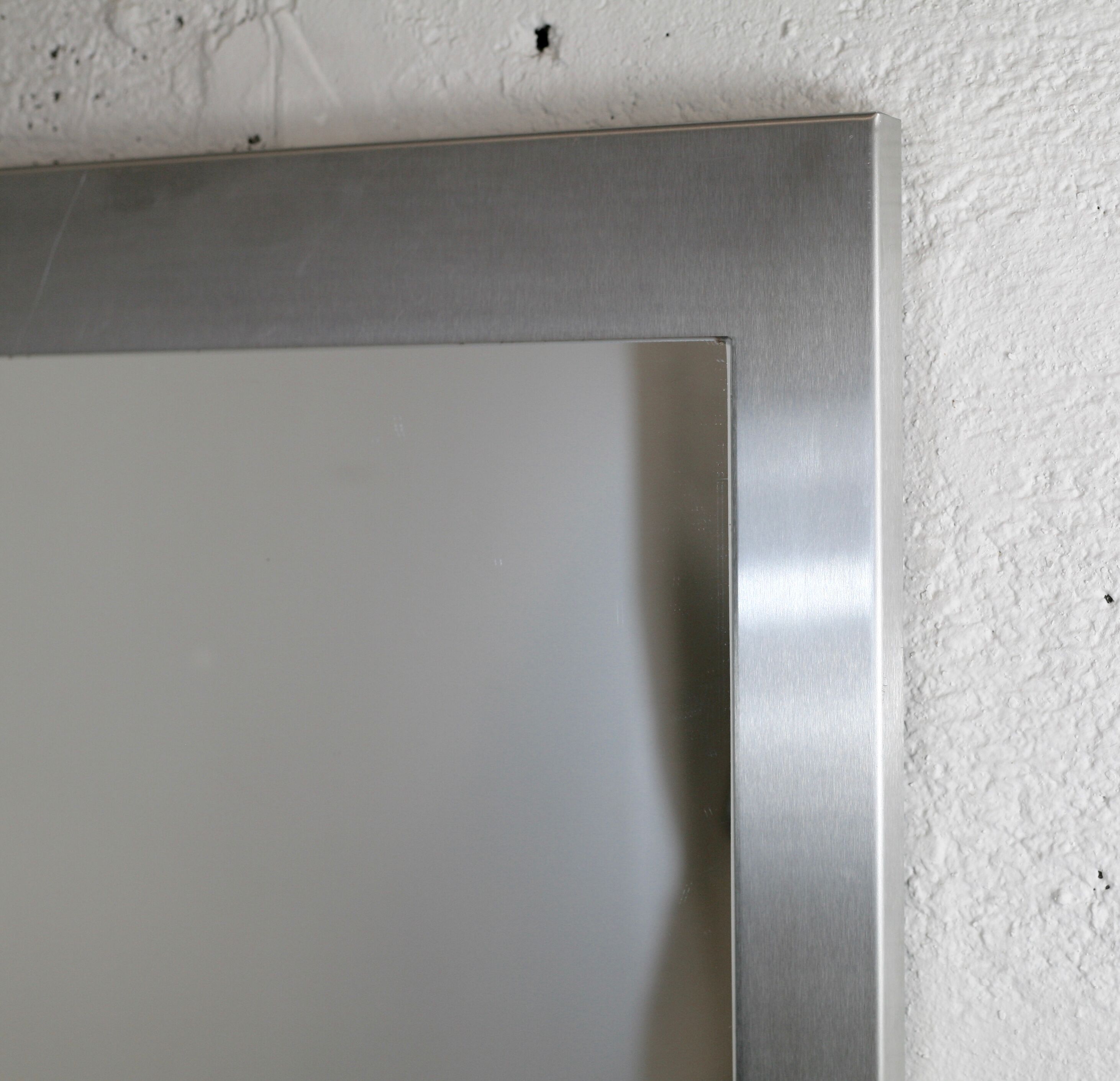 Mirror "space age". Stainless steel. France, circa 1970