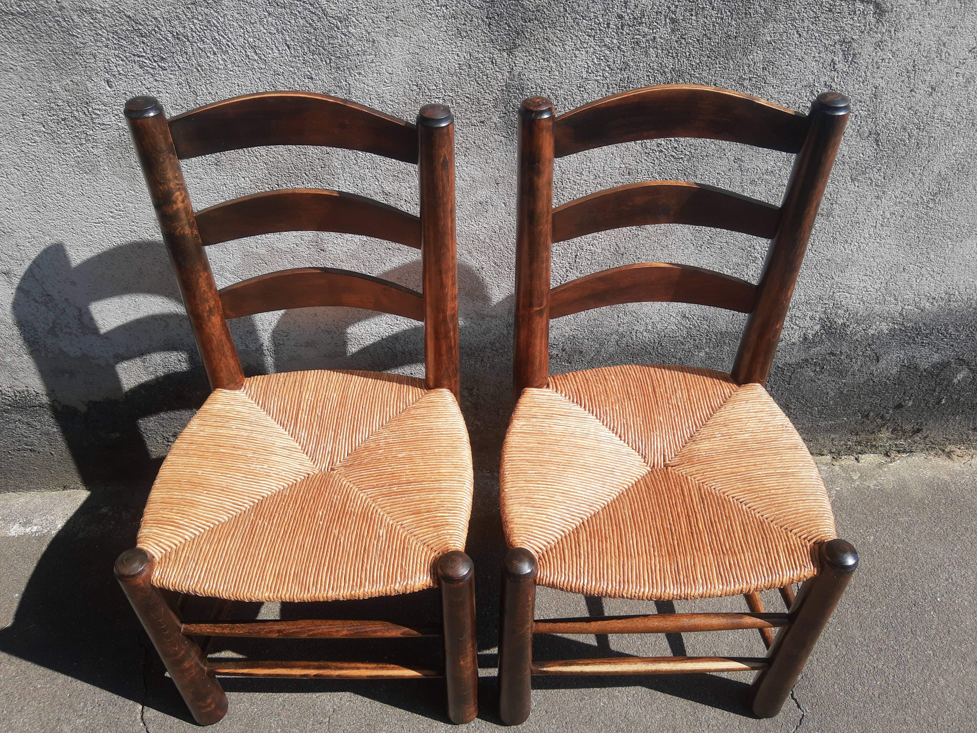 Pair of mulched brutalist chairs and wood