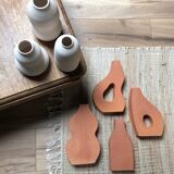 Flat vase in red earthenware, handmade by a creative craftsman