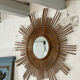 Large sun mirror in rattan