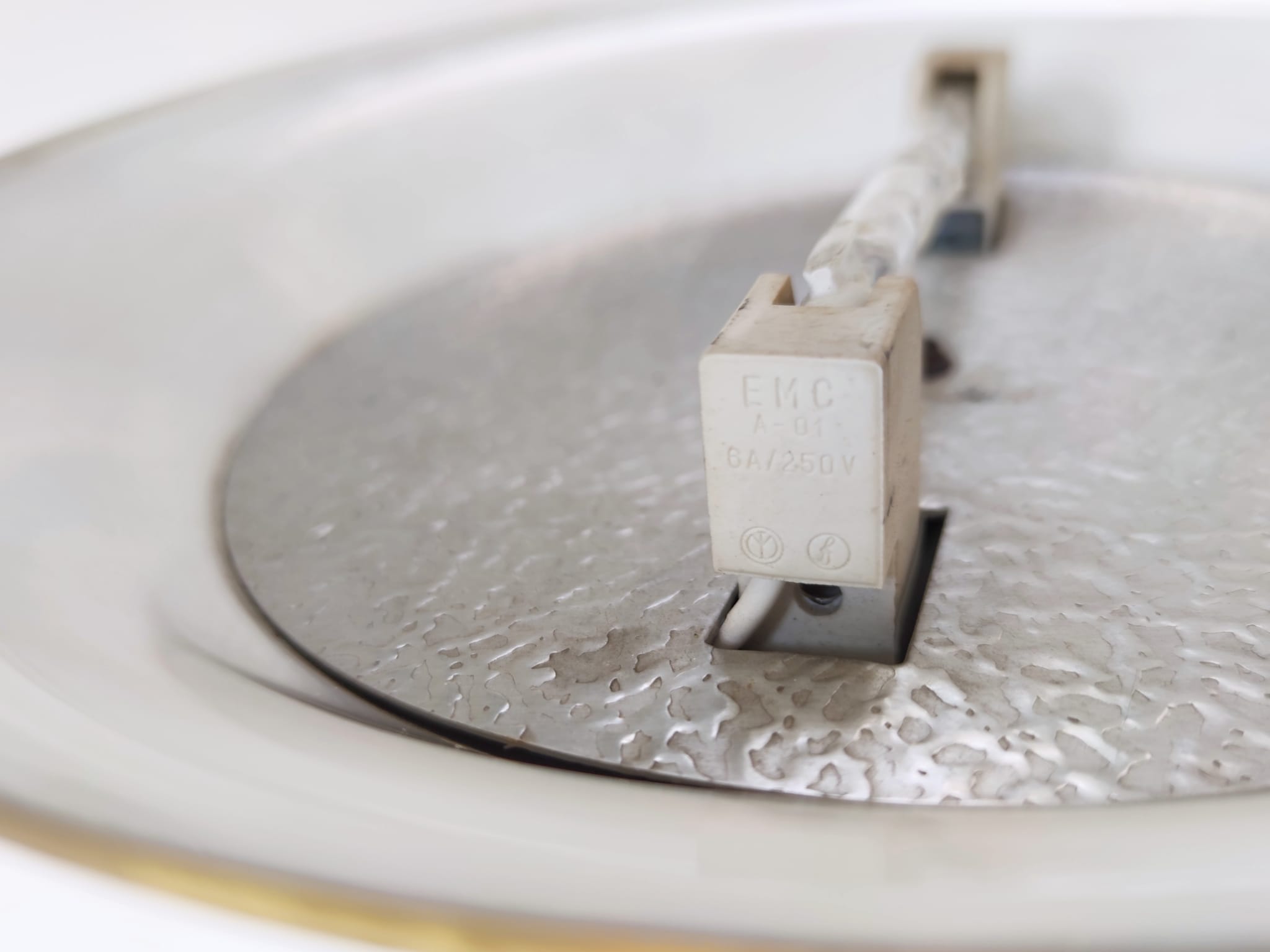 Halogen floor lamp in golden brass