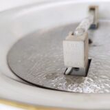 Halogen floor lamp in golden brass