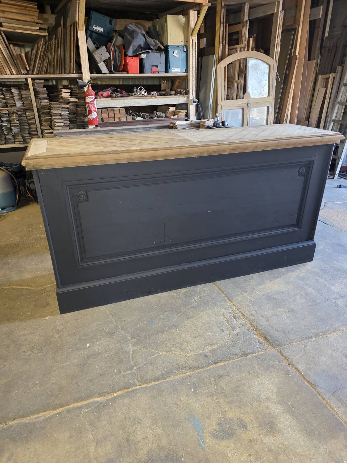 Chevron-patterned oak workbench