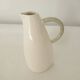White earthenware pitcher signed KG Lunéville
