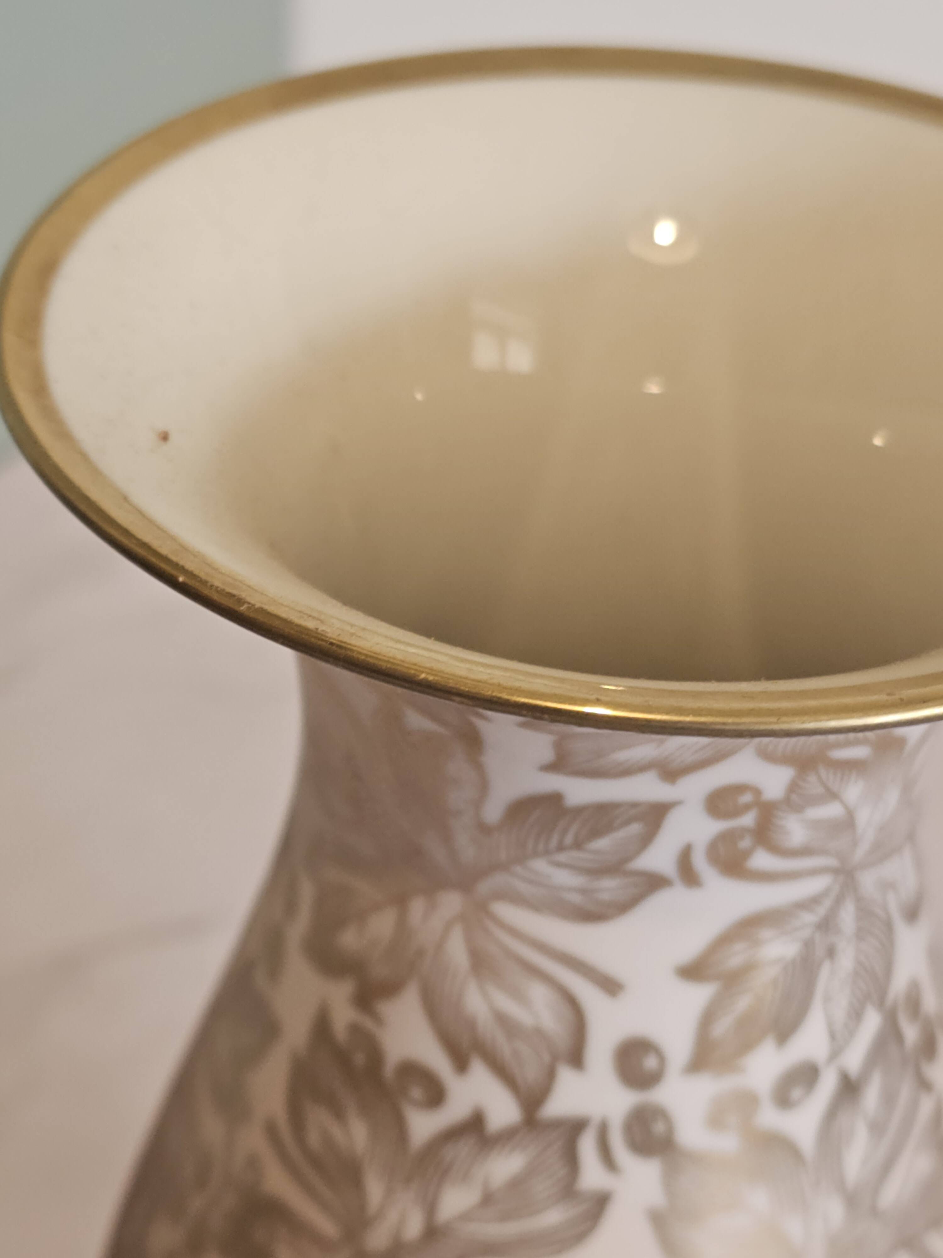 Porcelain vase with golden floral decoration by Johann Seltmann