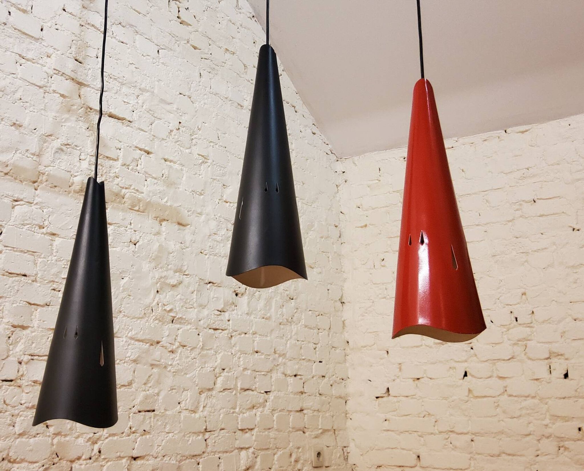 Vintage perforated metal suspensions
