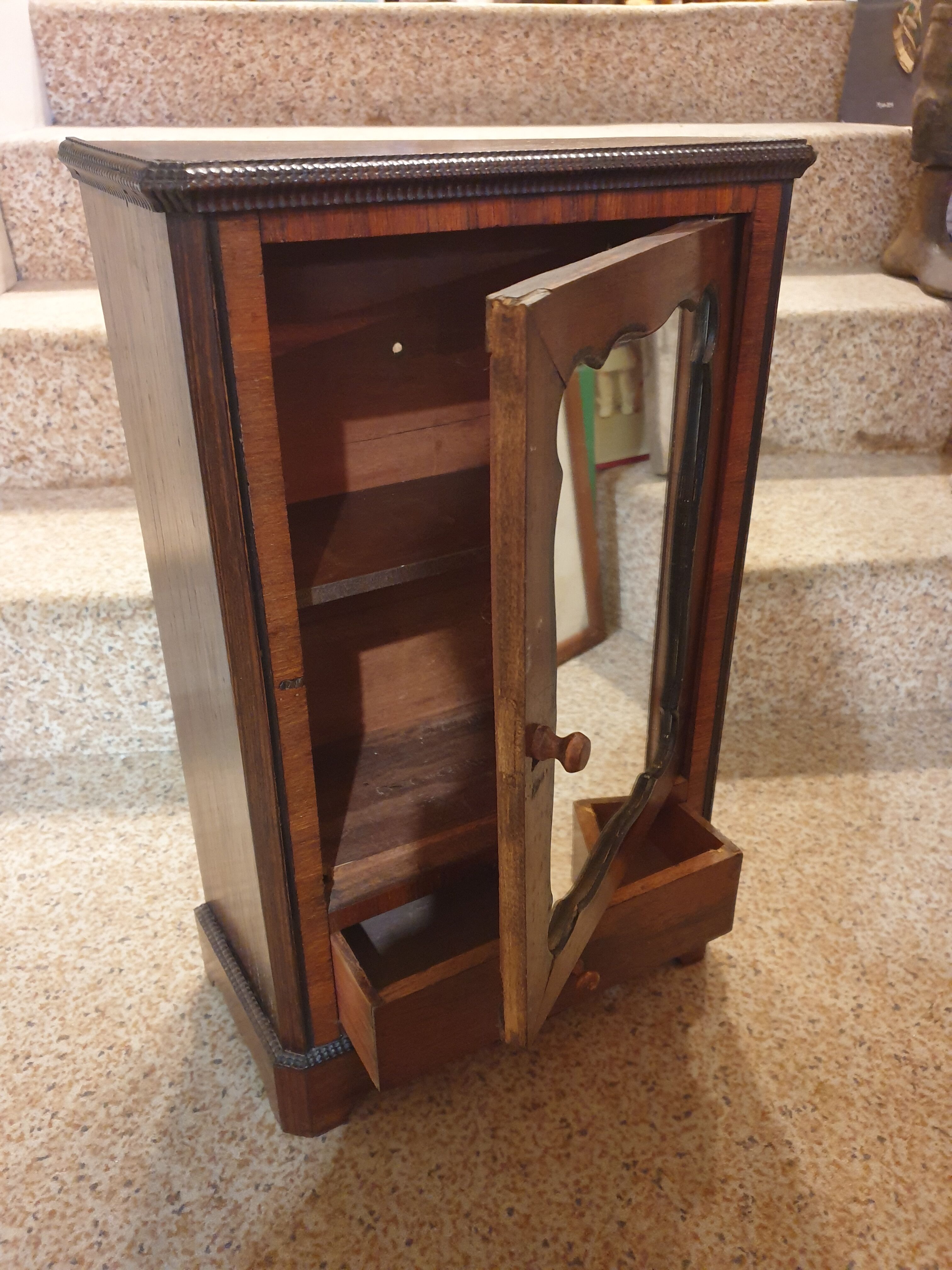 Antique doll cabinet