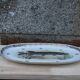 Large French porcelain dish L.C – Painted pike & gilded frieze