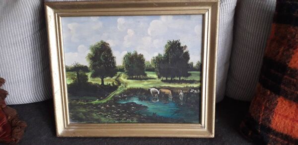 Tableau ancien représentant un paysage de campagne
