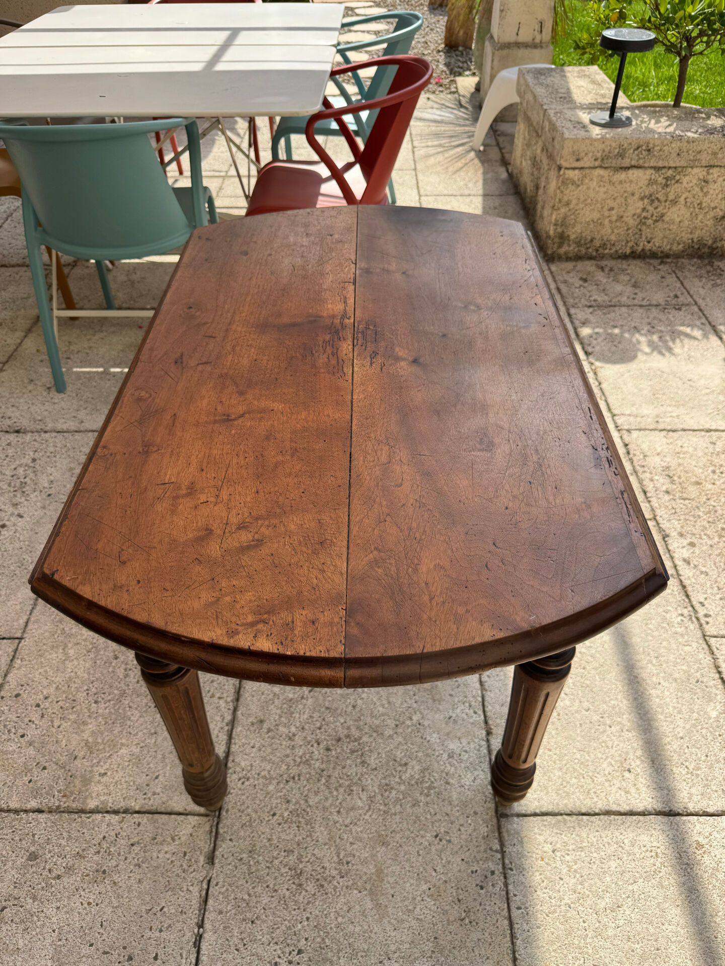 Farm table, two drop-leaves, 19th century, solid walnut.
