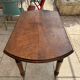 Farm table, two drop-leaves, 19th century, solid walnut.