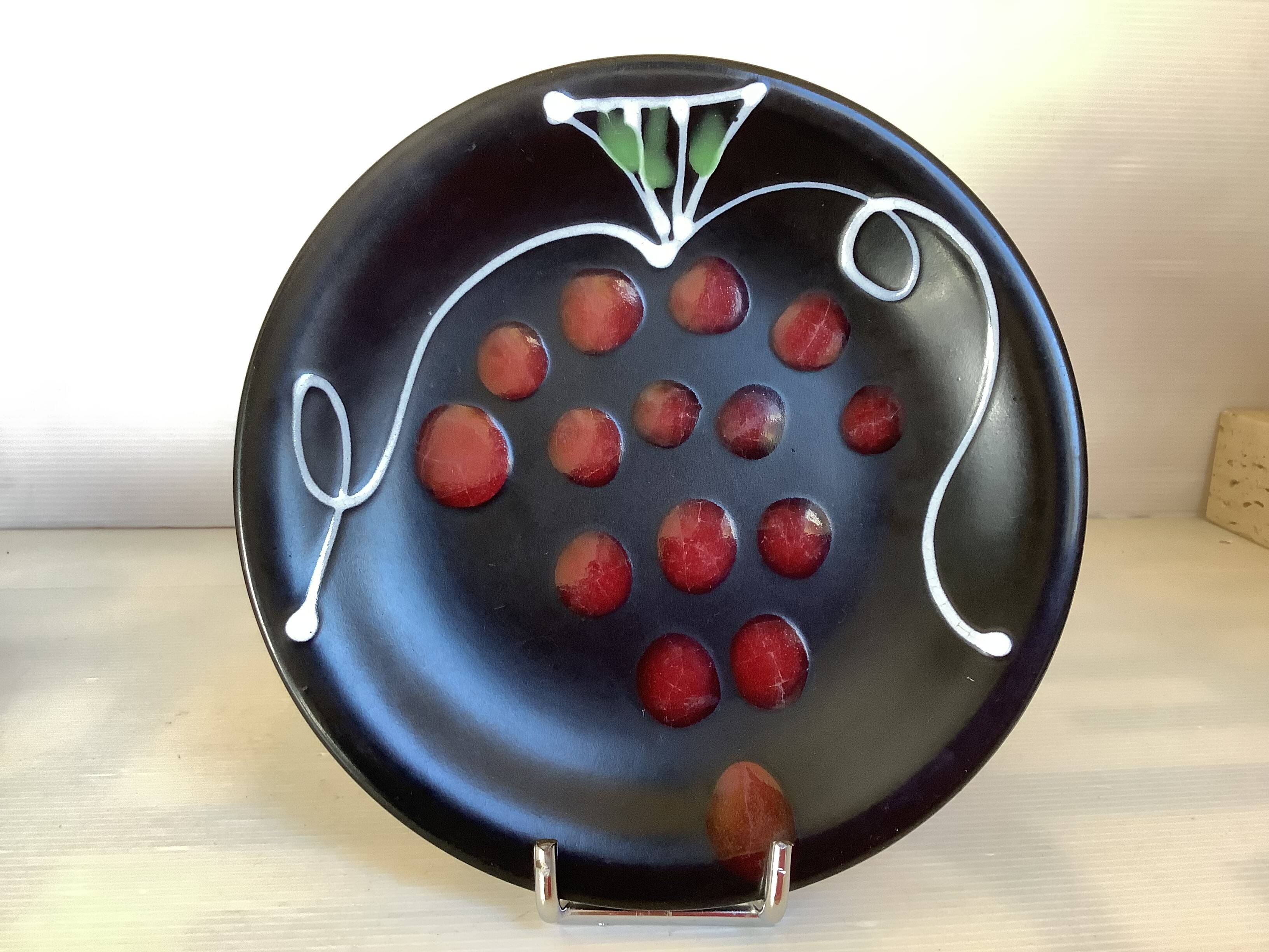 Six black glazed ceramic dessert plates