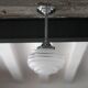 Art Deco pendant light, chrome metal suspension and glass globe, ceiling lamp.