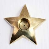 Star-shaped brass candle holder