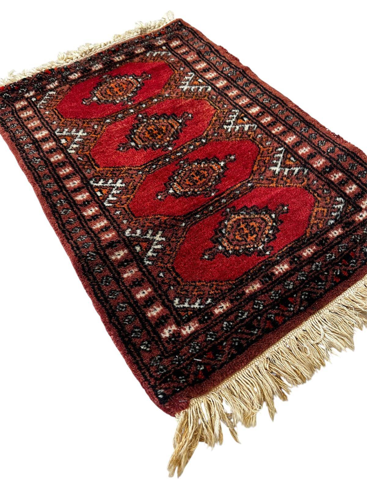 Tapis persan fait main 65cm x 40cm