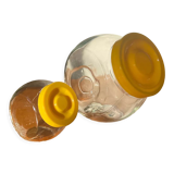 Pair of yellow vintage candy jars
