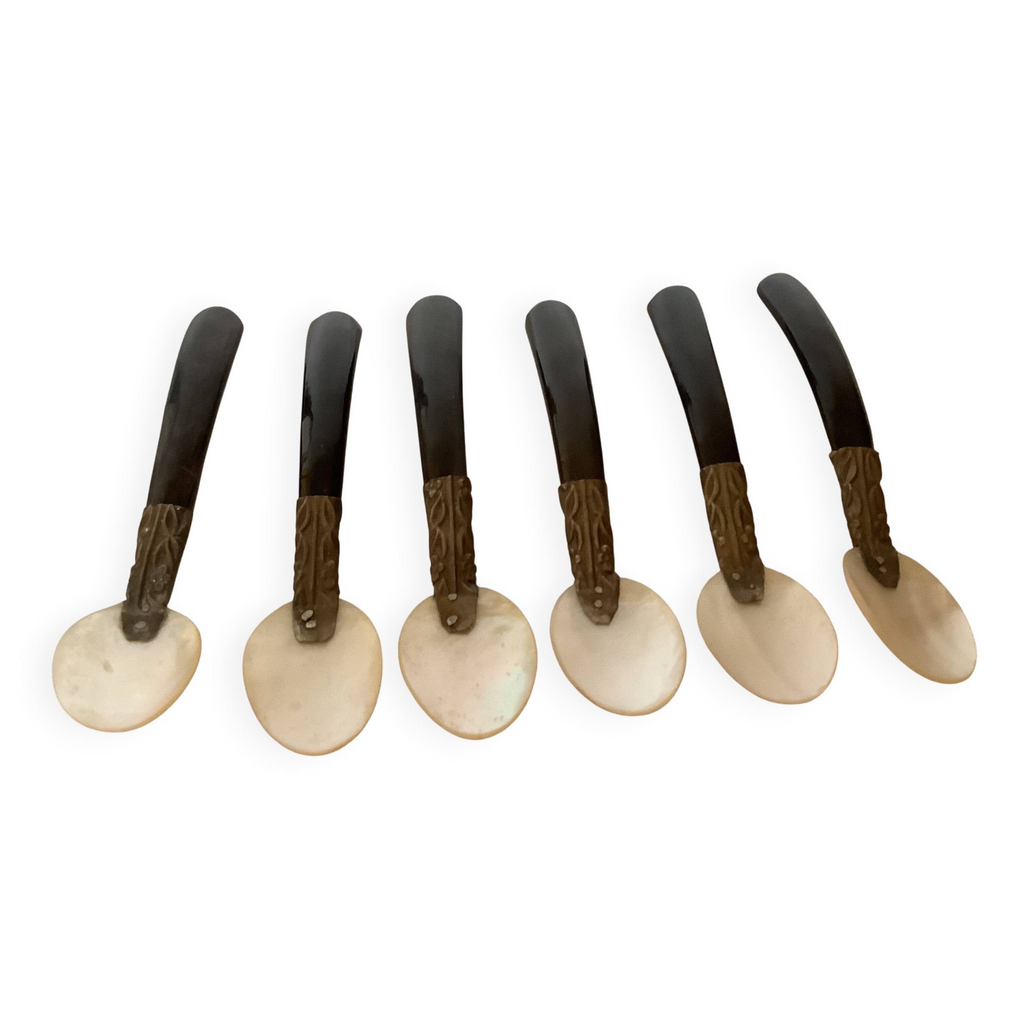 Six antique mother-of-pearl caviar spoons
