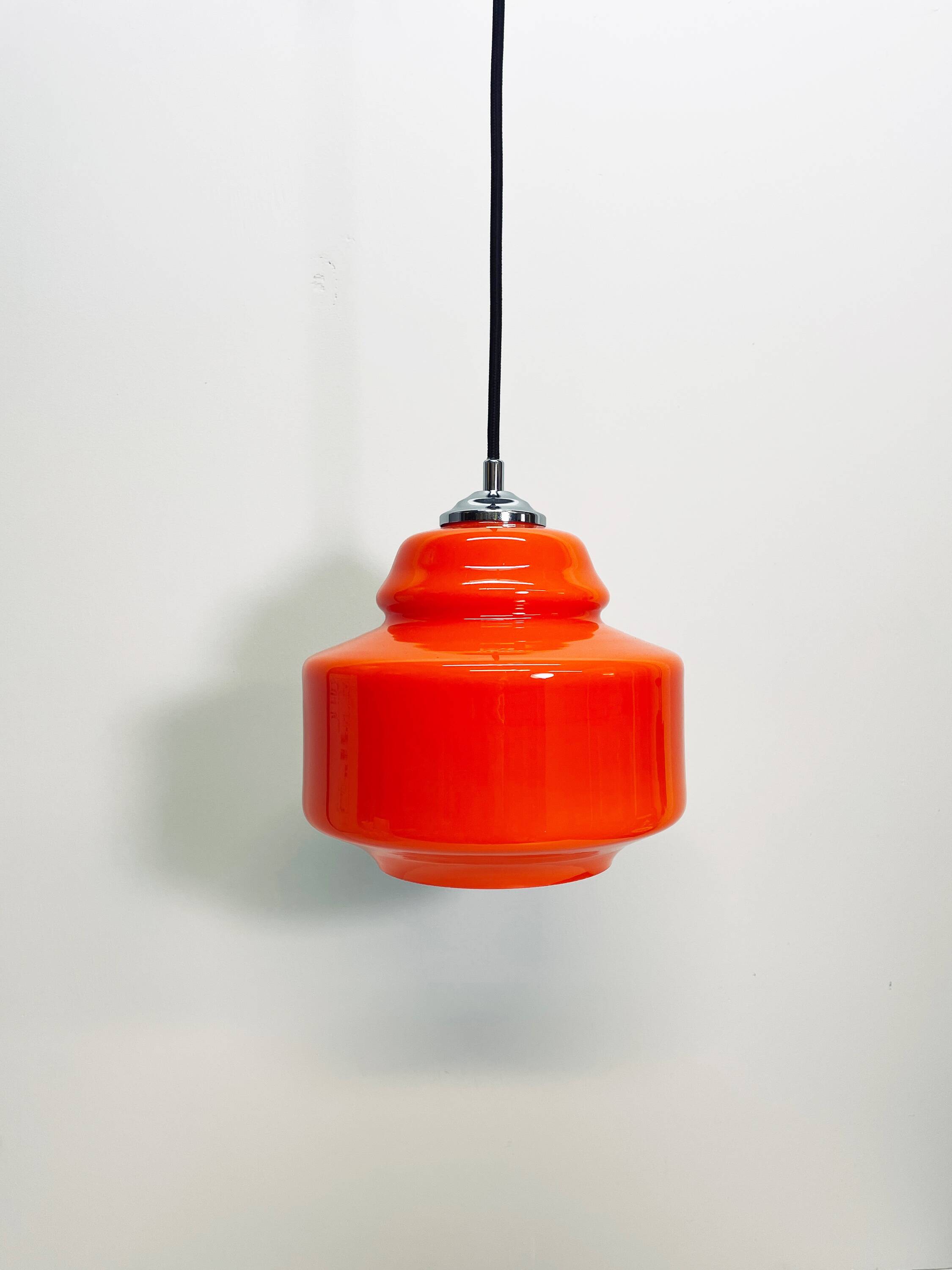 Orange glass pendant lamp Polam-Pila, 1970s.