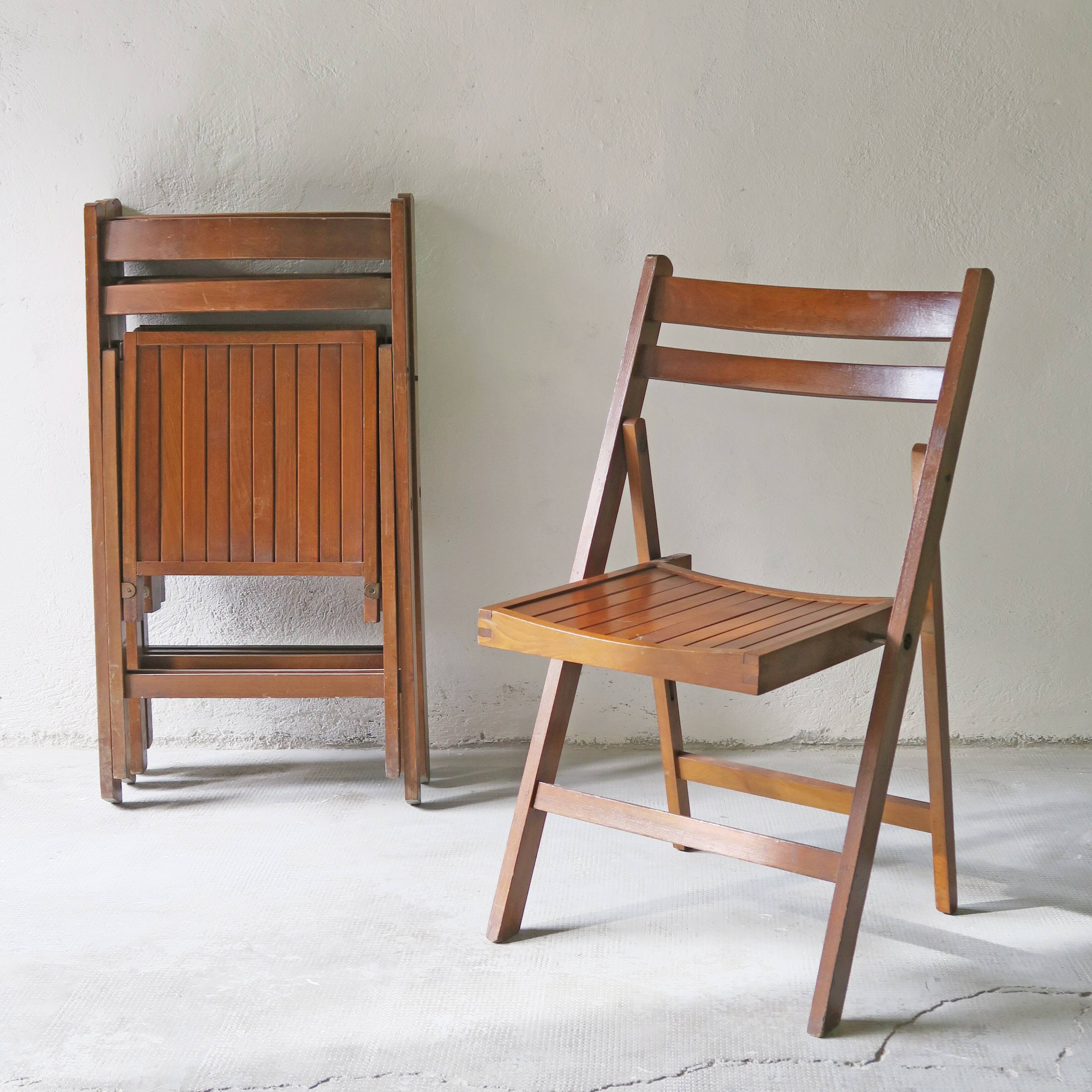 Series of 4 teak chairs