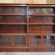 Antique pair of legal bookcases by William Baker Co in hardwood, satin and walnut.
