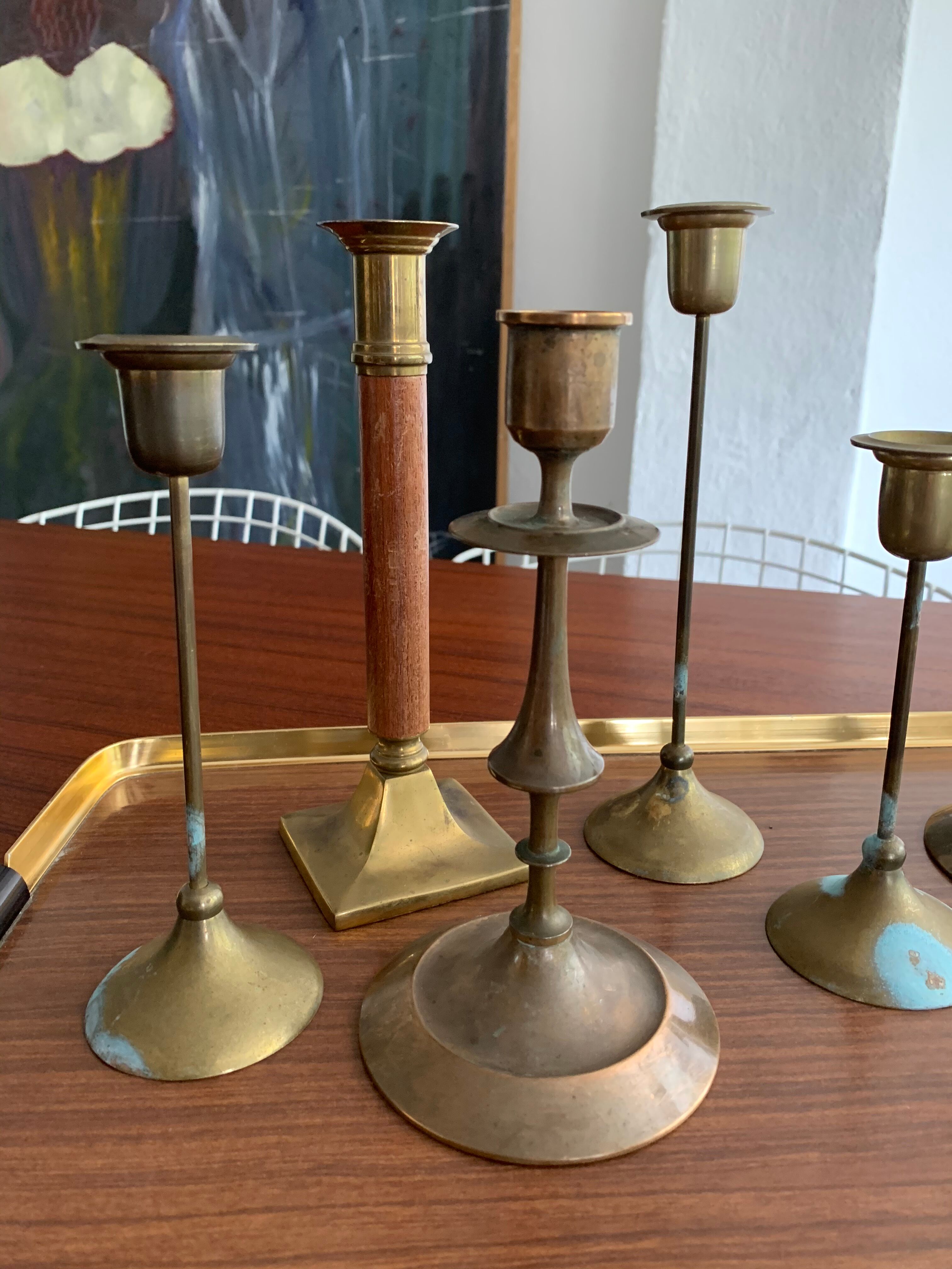Set 7 mismatched brass and bronze candlesticks