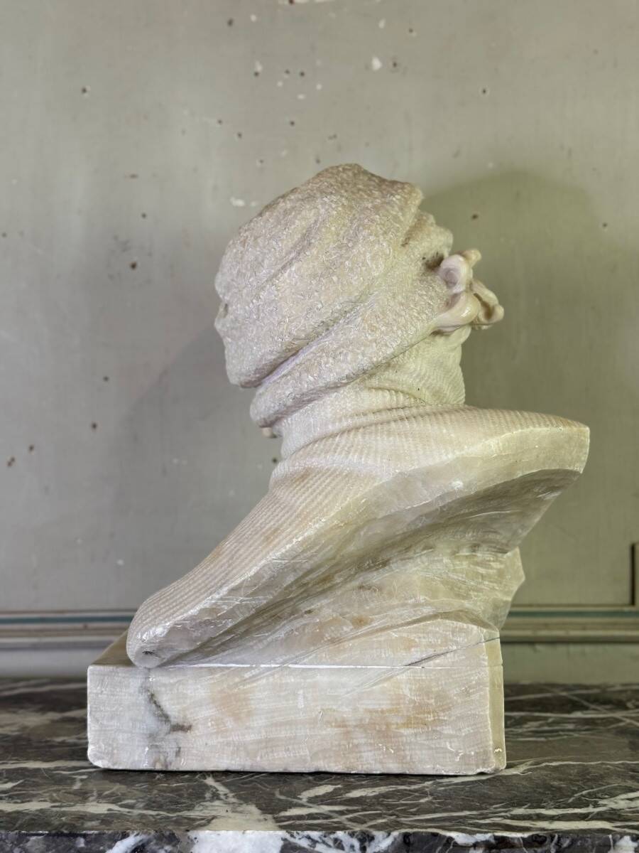 Alabaster bust of a young girl with a turtleneck, signed Caloni, Italy circa 1900