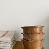 Set of three bowls in ancient sandstone