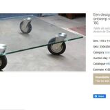 Beautiful designer glass coffee table on wheels