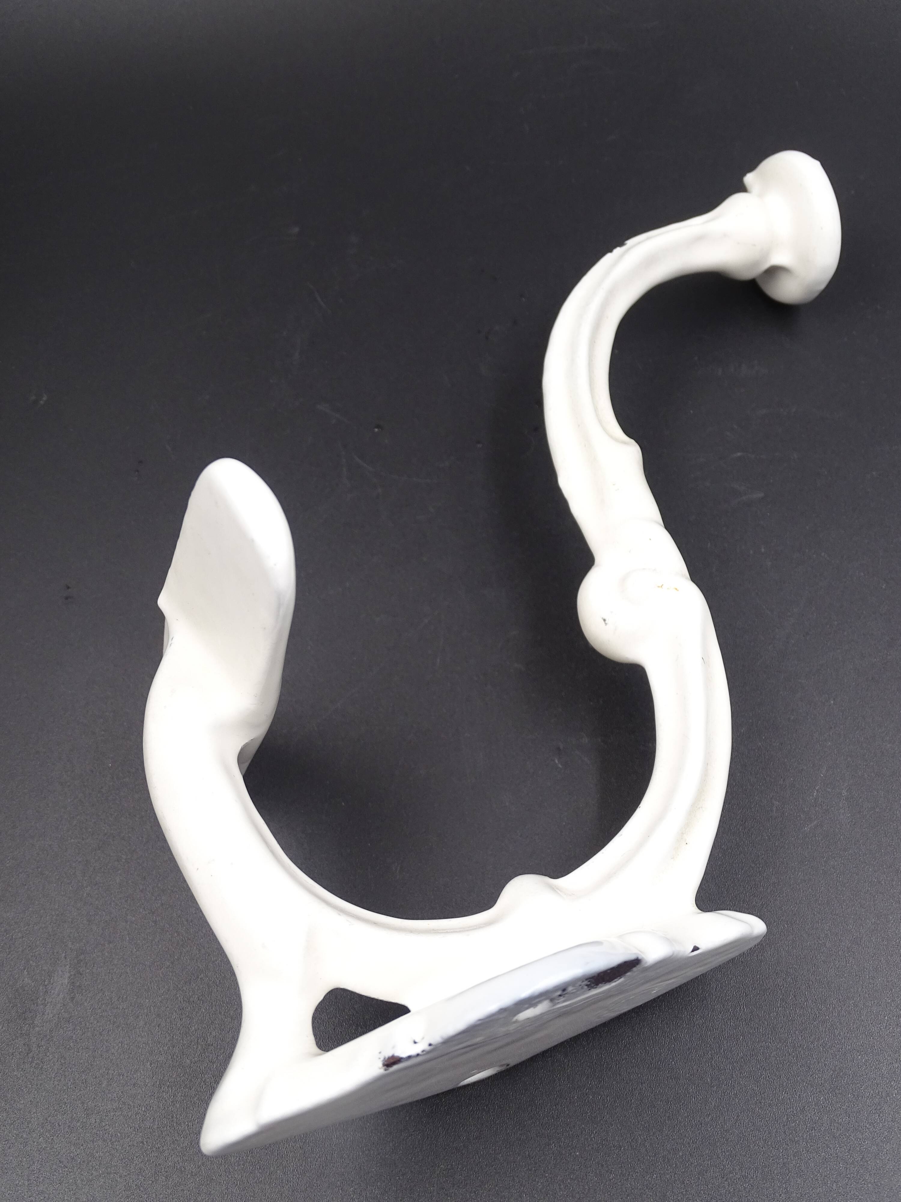 Old white enamelled metal patère