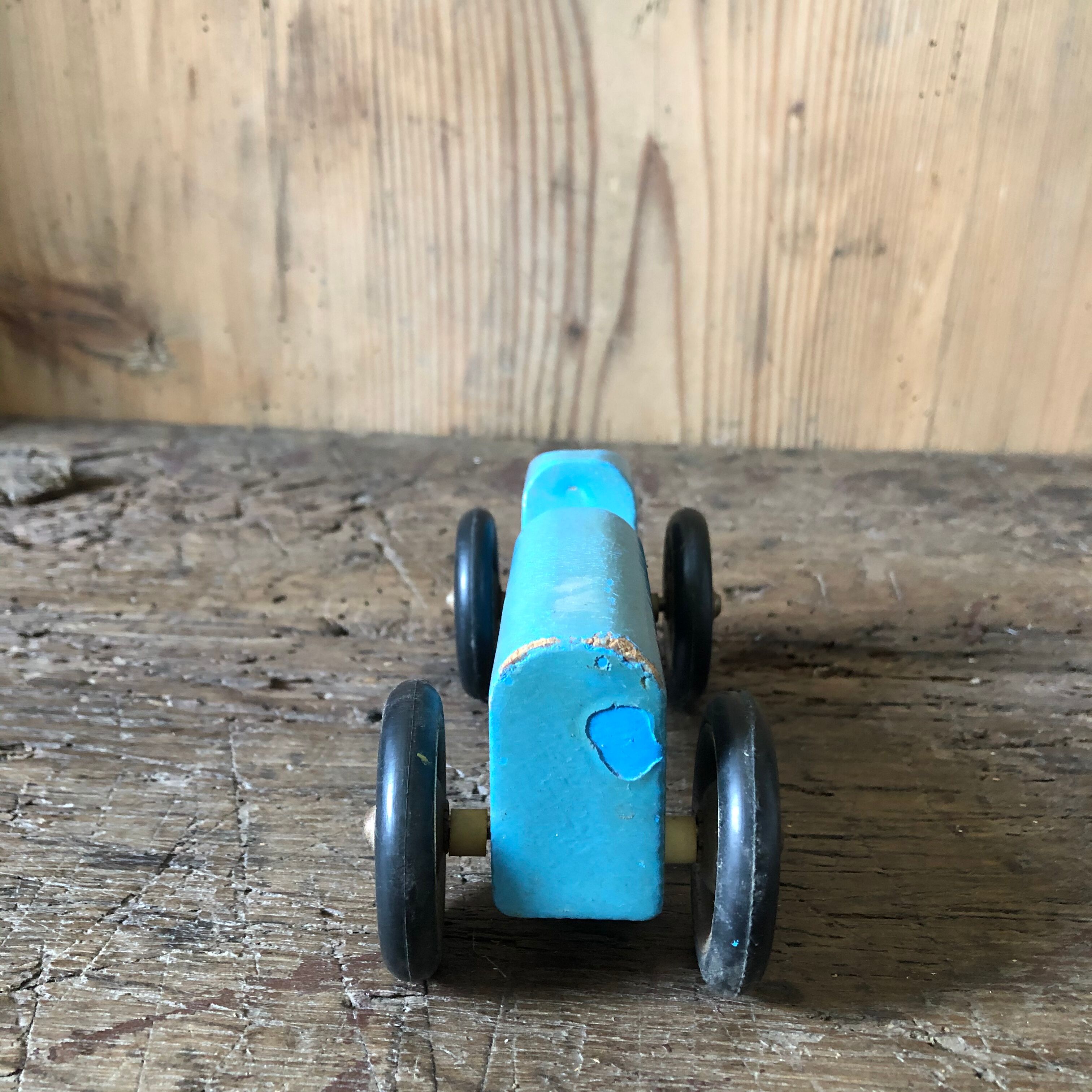 Old painted wooden toy car