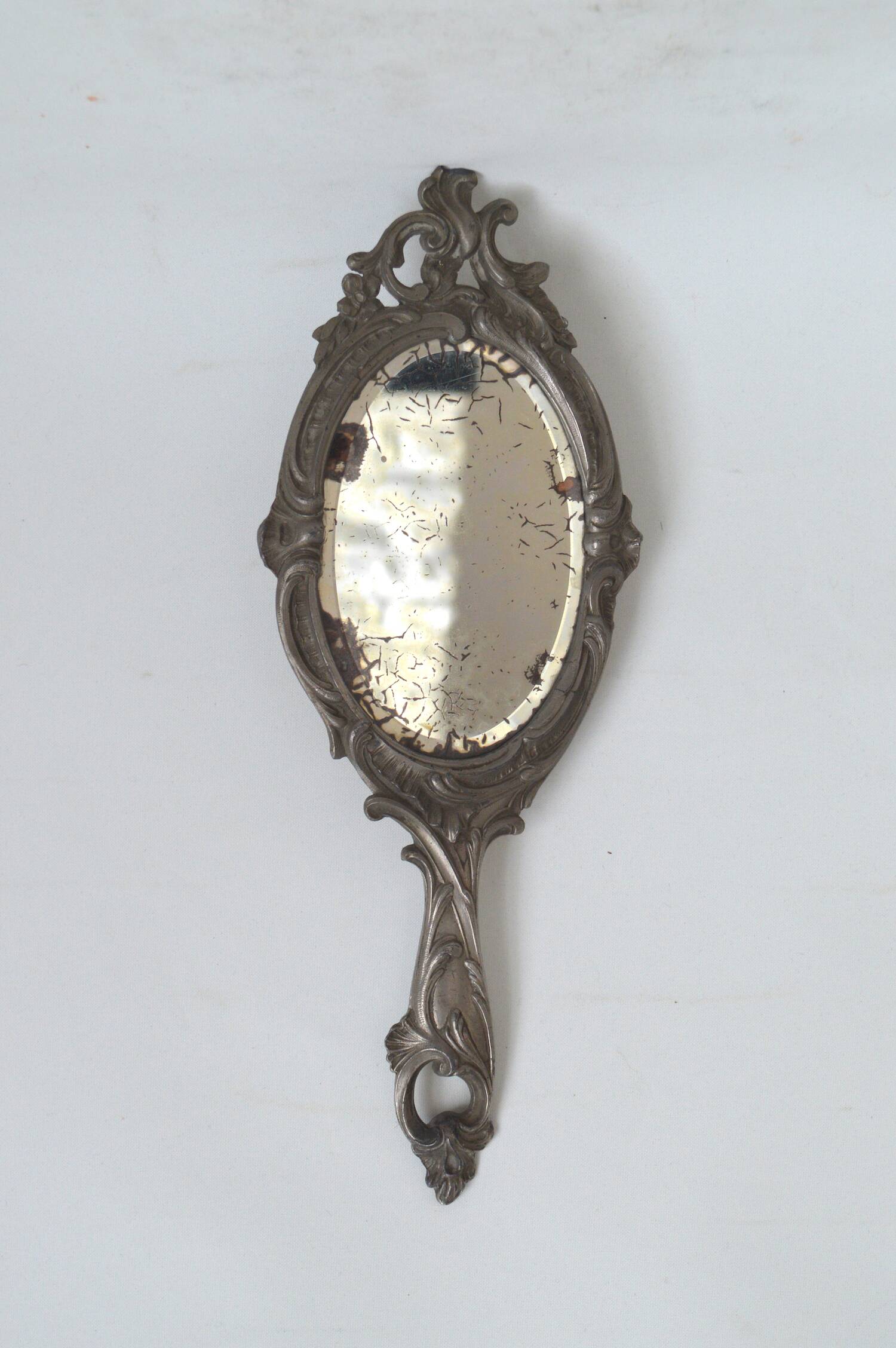 Pewter hand mirror