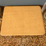 A pair of rattan bedside tables.