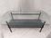 Modernist coffee table with double glass top and black metal - 1950s.