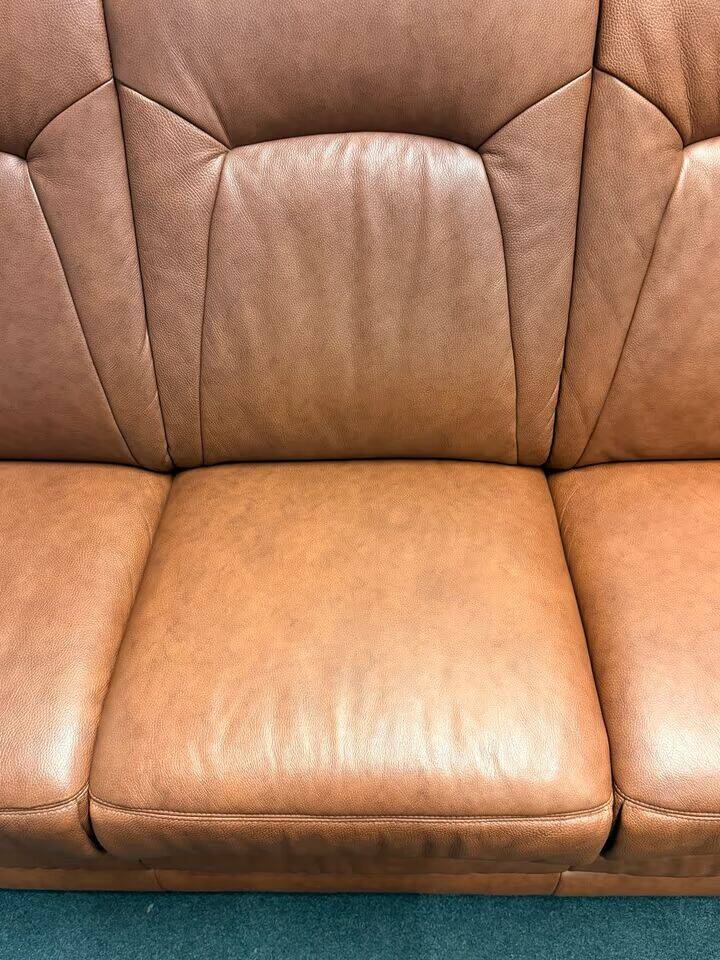 Leather  2-piece set-sofa and armchair from Elastoform