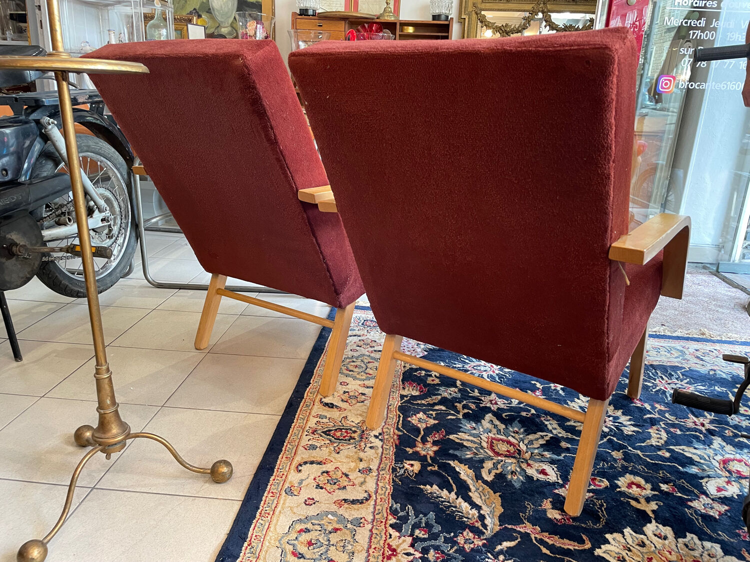 Burgundy Scandinavian armchairs