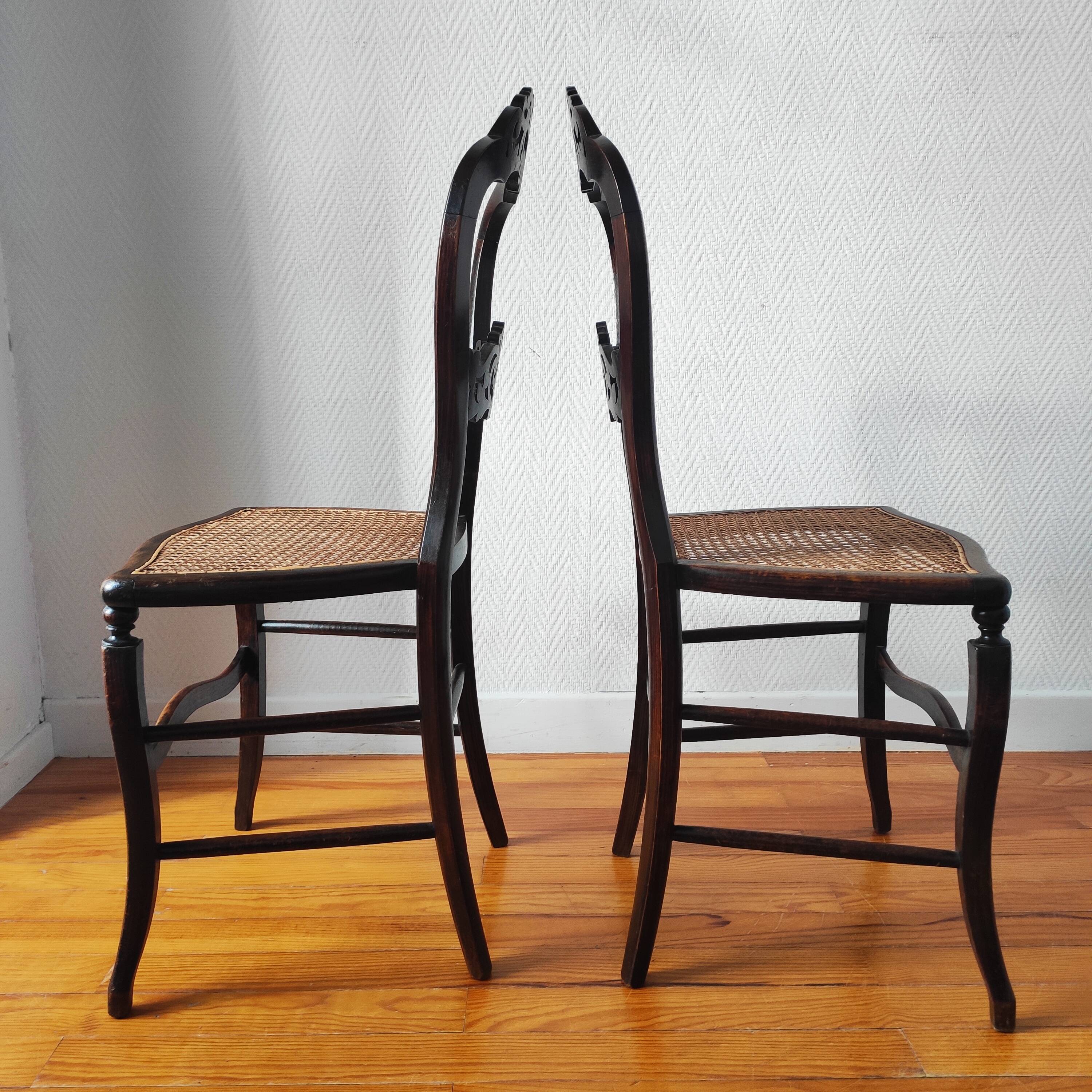 Pair of chairs from the early 20th century, Napoleon III style, with caned seats.