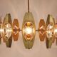 Oscar Torlasco brass chandelier of 25 inches with optical prism lenses, Italy, 1970s.