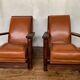 PAIR OF BRUTALIST ARMCHAIRS IN TEAK AND VINTAGE COGNAC LEATHER FROM THE 1950S