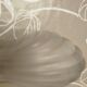 Art Deco wall light in frosted pink glass shell design.