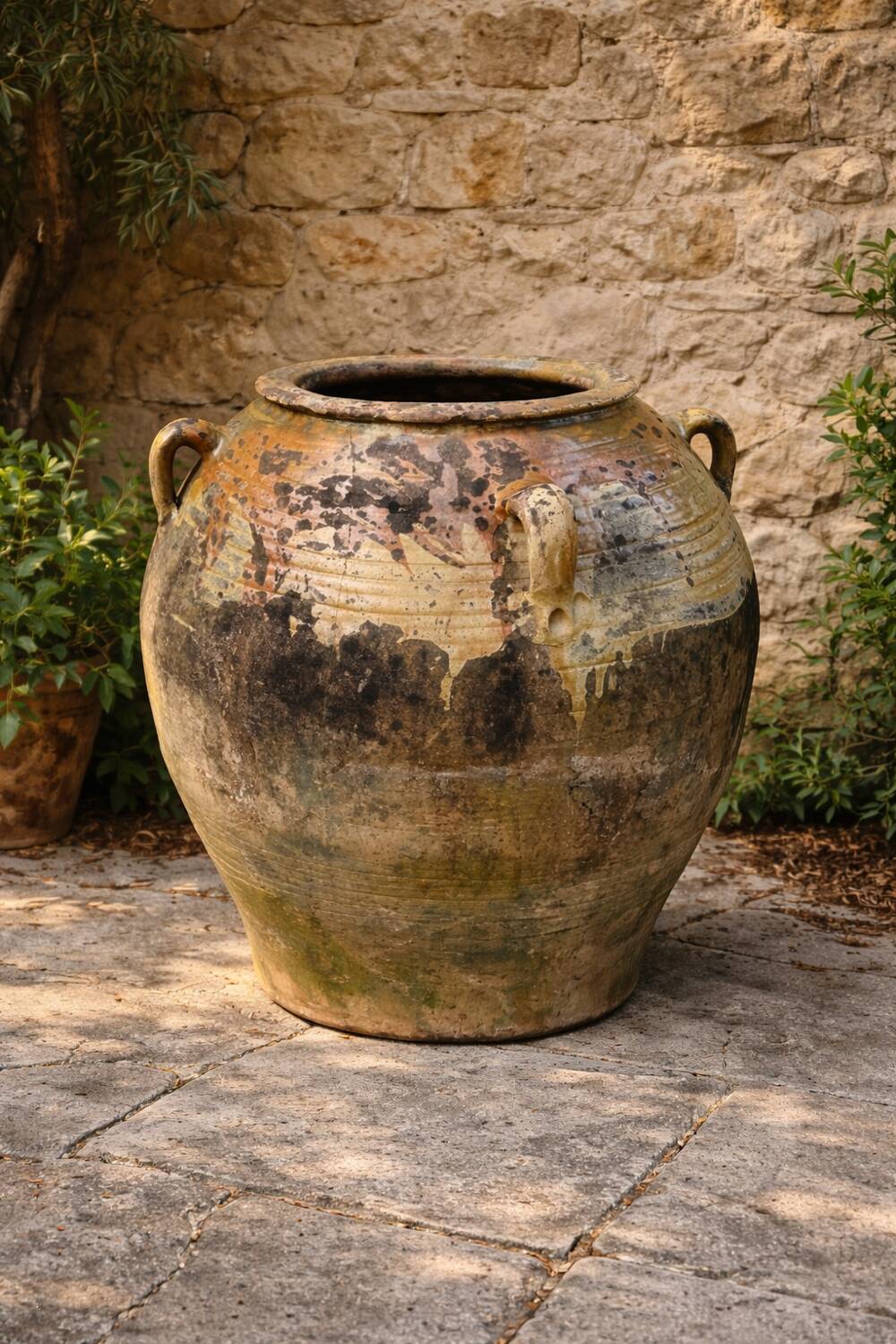 Large ancient jar in glazed terracotta