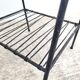Small vintage yellow side table with magazine rack.