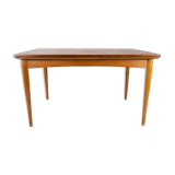 Dining table in teak with extentions and legs in oak, of danish design from the 1960s.