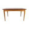 Dining table in teak with extentions and legs in oak, of danish design from the 1960s.