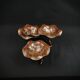 Three-tiered lotus leaf shaped patinated metal bird bath