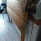 Headboard made with two art nouveau doors in walnut, waxed finish,