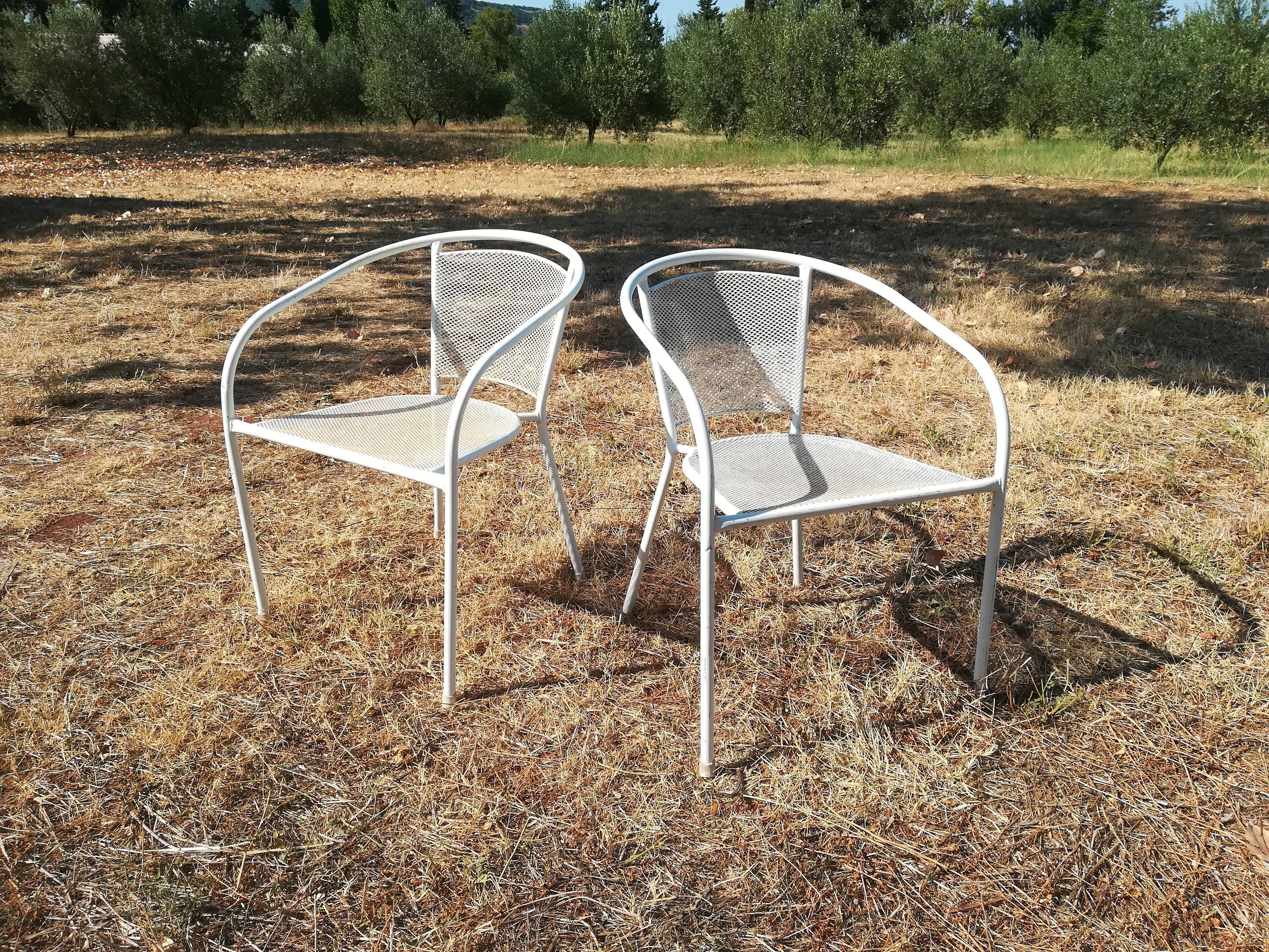 Pair of vintage white metal terrace armchairs