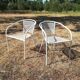 Pair of vintage white metal terrace armchairs