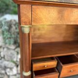 A small piece of Bonheur du jour with detached columns in Empire-era mahogany.
