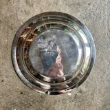 Round, hollow silver-plated metal dish